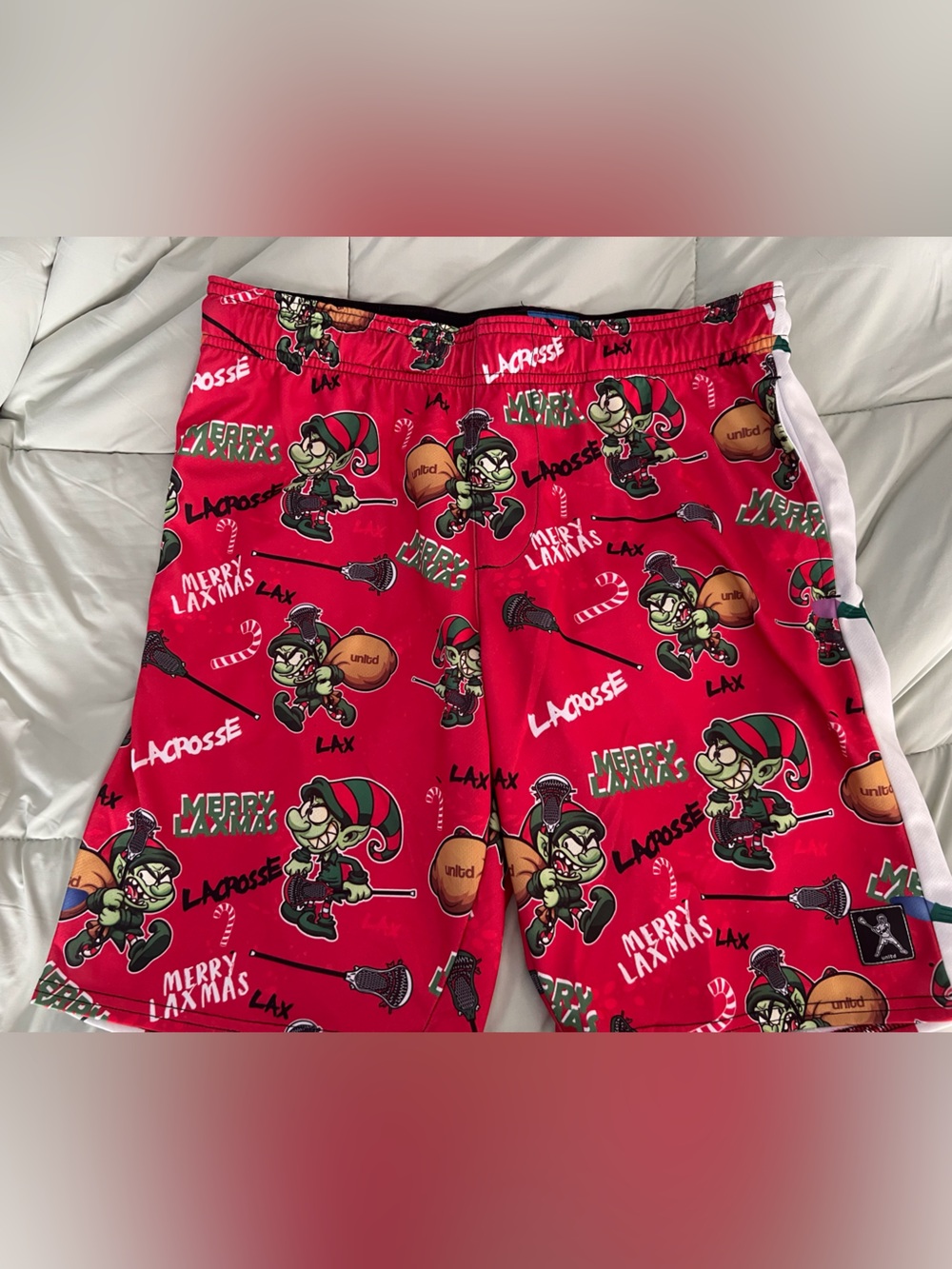 Lacrosse Unlimited Red Holiday Lacrosse Print Shorts
